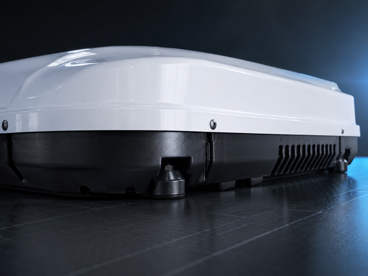 X2 Helix Gen II white rooftop air conditioner side profile showing updated shroud, black lower base, venting, and integrated leveling feet.