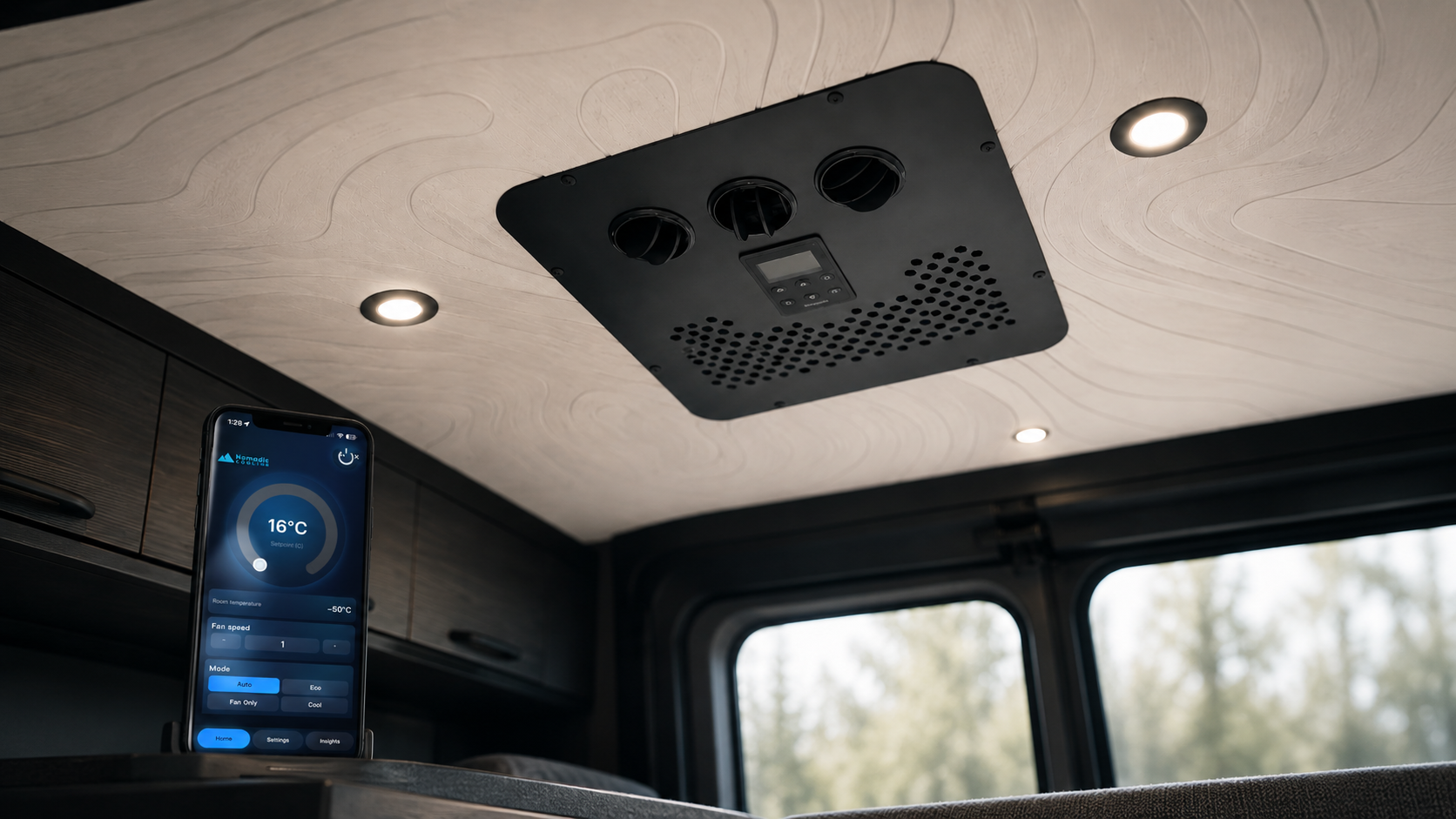 X2 Helix Gen II interior faceplate installed in a van ceiling with the Nomadic Controls app shown on a phone for rooftop air conditioner control.