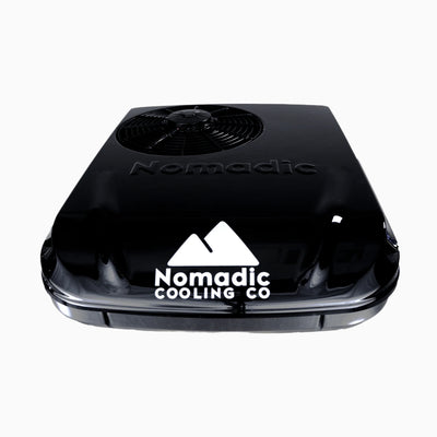 Compact black rooftop air conditioner designed for use in camper vans and smaller RVs.